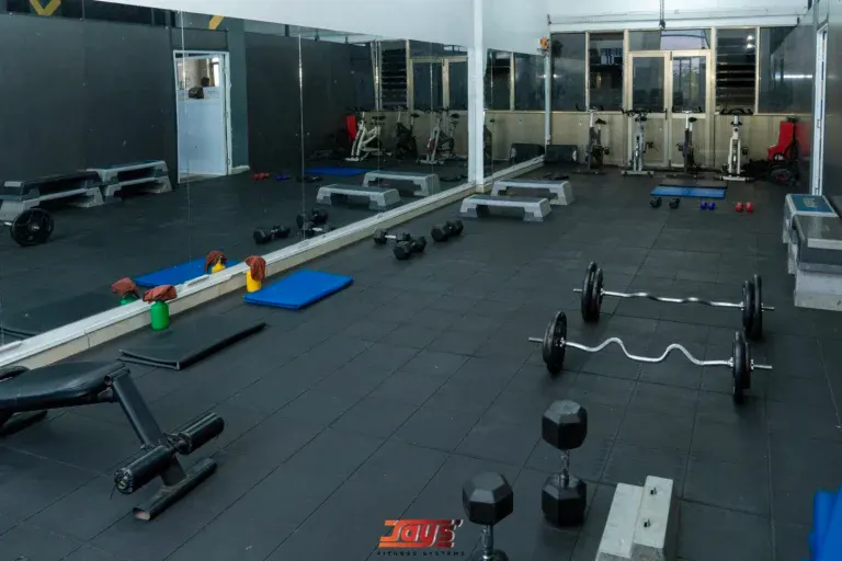 Group fitness studio with steps and mats